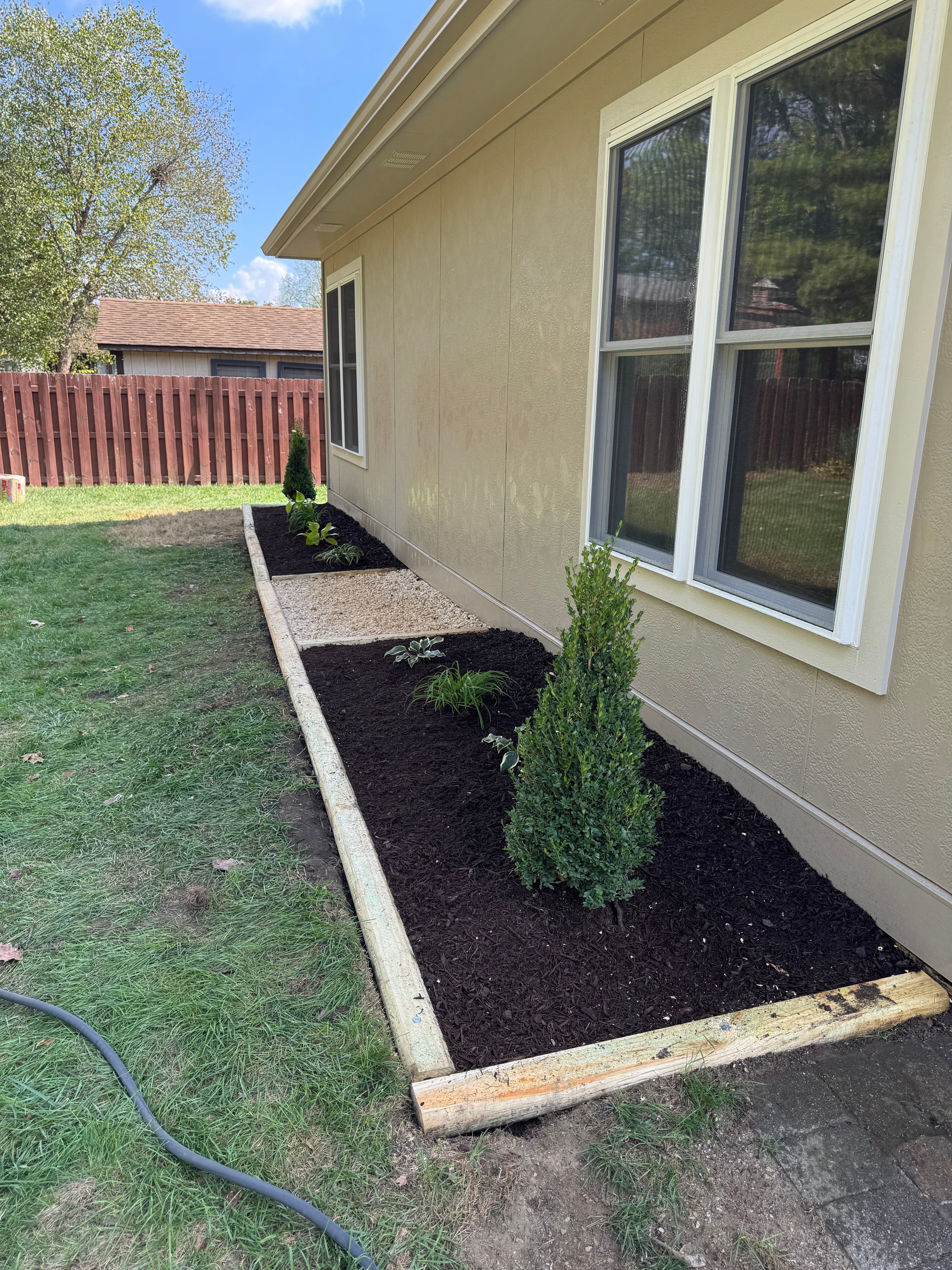 Project Bare Foundation Beds Get a Clean Garden Makeover in Worthington image