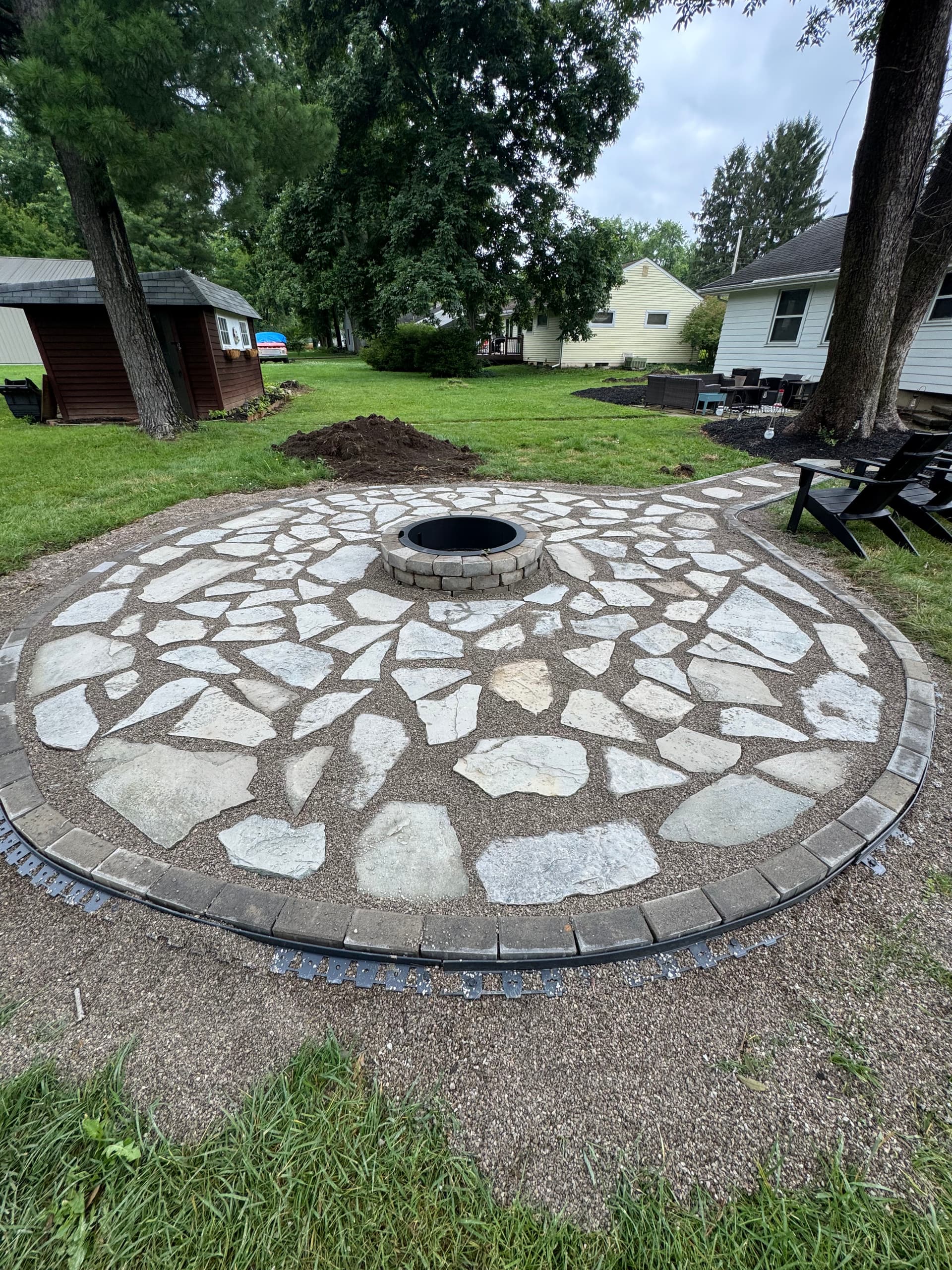 Gallery photos for Flagstone Fire Pit Patio Built for Real Backyard Living in Worthington: Image #5